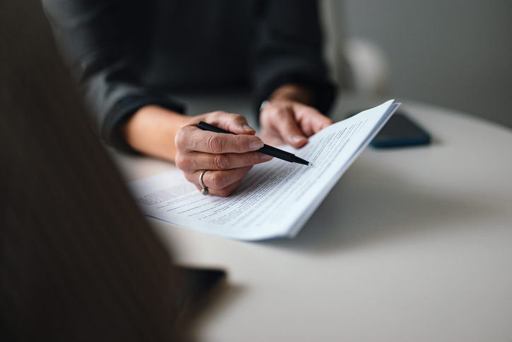 person reviewing documents